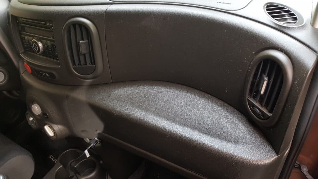 The Nissan Cube interior's whimsical face.